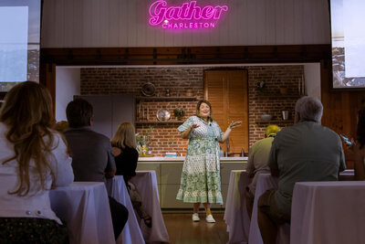 Woman speaking to a group at Gather Charleston